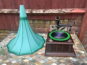 Good working order both drive springs replaced with new ones motor serviced good sized horn new beige wood cleaned and given a polish,