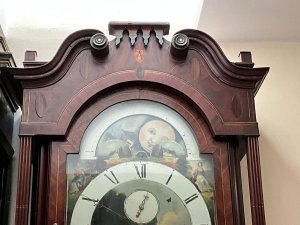 Quality clock in good working order, flame mahogany cased with inlays some of which needs replacing as missing, circa 1760's having an eight day duration, the movements in very good working condion, painted dial moon which needs some touching in and ship 24 hours rotates, the clock stands 235cm width at widest 85cm depth at deepest 30cm,