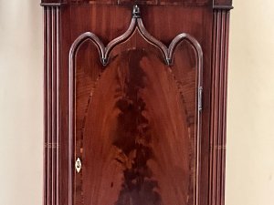 Quality clock in good working order, flame mahogany cased with inlays some of which needs replacing as missing, circa 1760's having an eight day duration, the movements in very good working condion, painted dial moon which needs some touching in and ship 24 hours rotates, the clock stands 235cm width at widest 85cm depth at deepest 30cm,