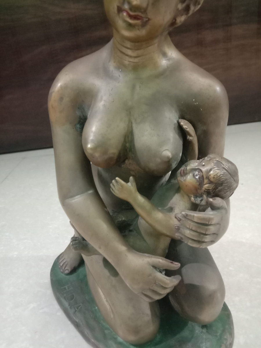 Mother Feeding Brass Statue