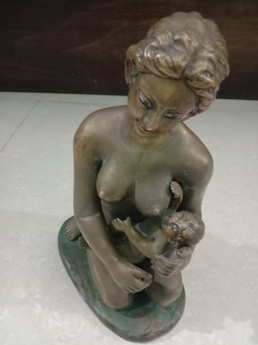Mother Feeding Brass Statue
