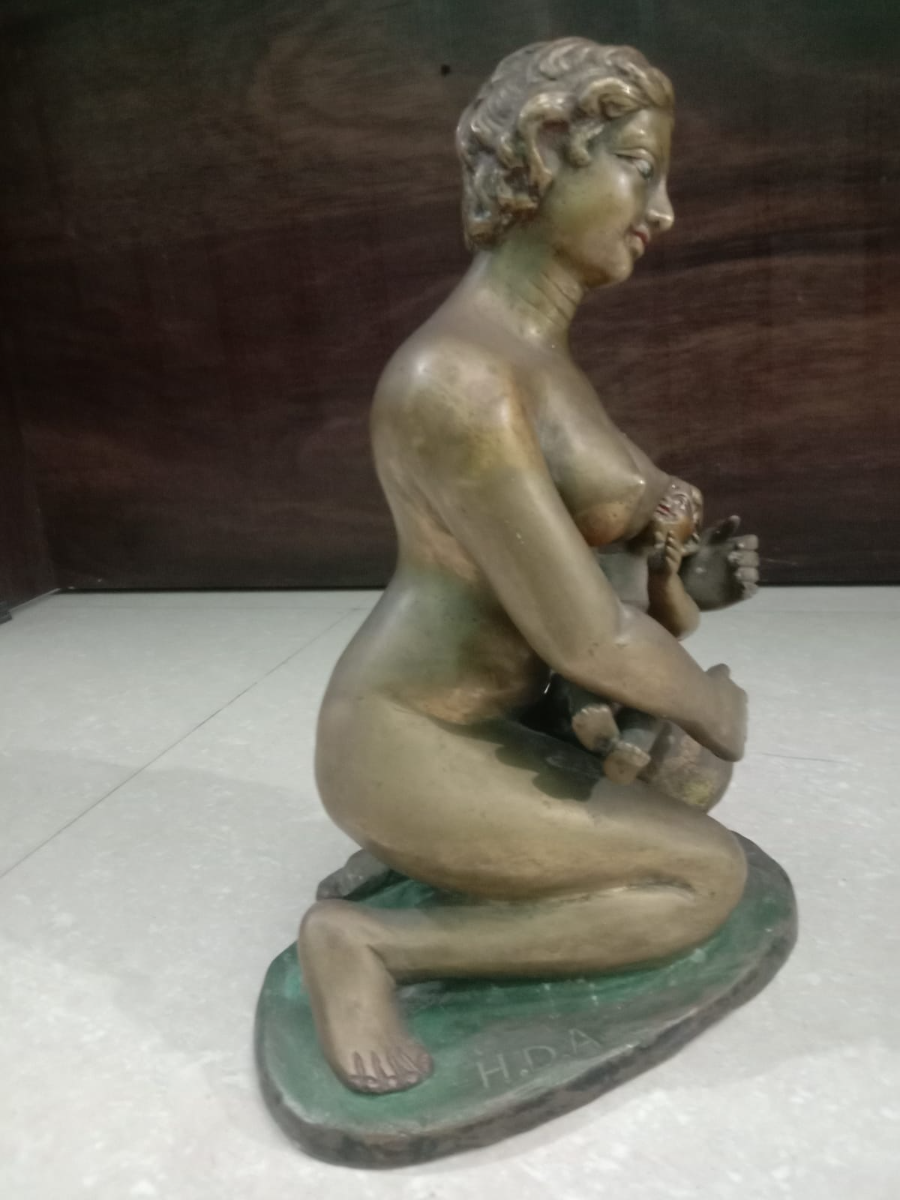 Mother Feeding Brass Statue