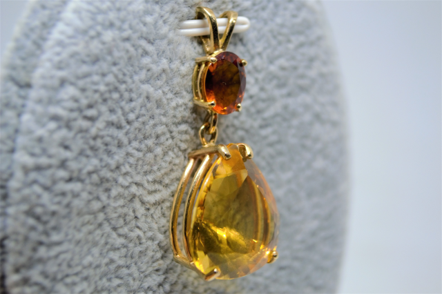 Explore our stunning 14k yellow gold pendant featuring an oval citrine drop & pearl citrine. Get your gold stamped 14k pendant now & amp up your fashion game!