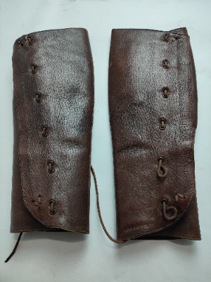Discover rare WW1 private purchase leather gaitors. Unique 48041 soldier number, possibly regiment-specific. Learn more, research, and shop our military memorabilia now.