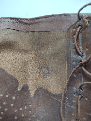 Discover rare WW1 private purchase leather gaitors. Unique 48041 soldier number, possibly regiment-specific. Learn more, research, and shop our military memorabilia now.