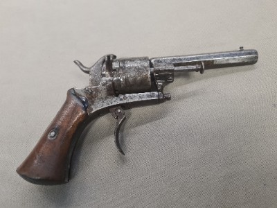 Discover unique 7mm Belgian pinfire revolvers in our collection. Though the mechanism doesn't work, its caliber is unbeatable. Shop today for absolute antique quality!