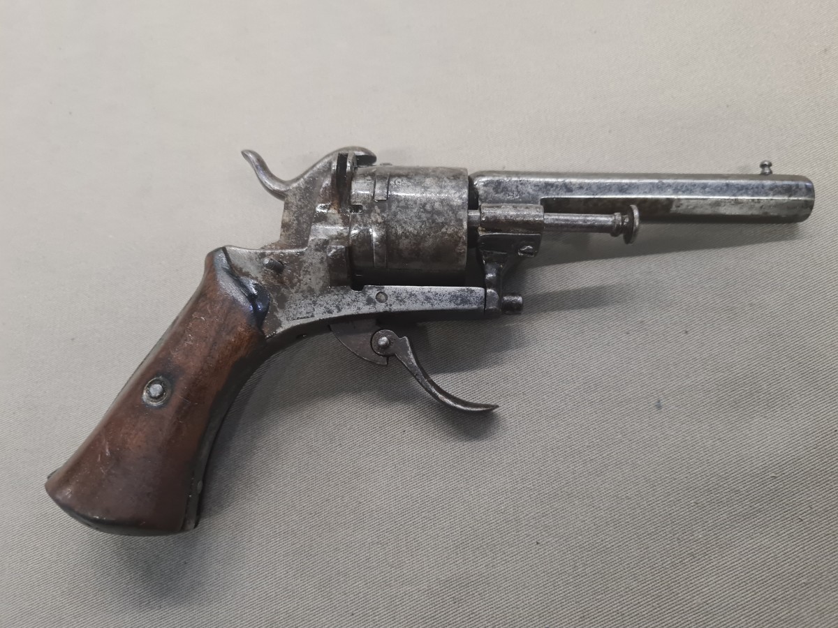 Discover unique 7mm Belgian pinfire revolvers in our collection. Though the mechanism doesn't work, its caliber is unbeatable. Shop today for absolute antique quality!