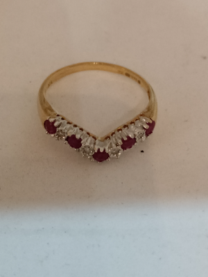 Explore our 9ct gold half eternity ring, adorned with rubies and diamonds. Symbolizing passion, love, and authenticity. Order now!