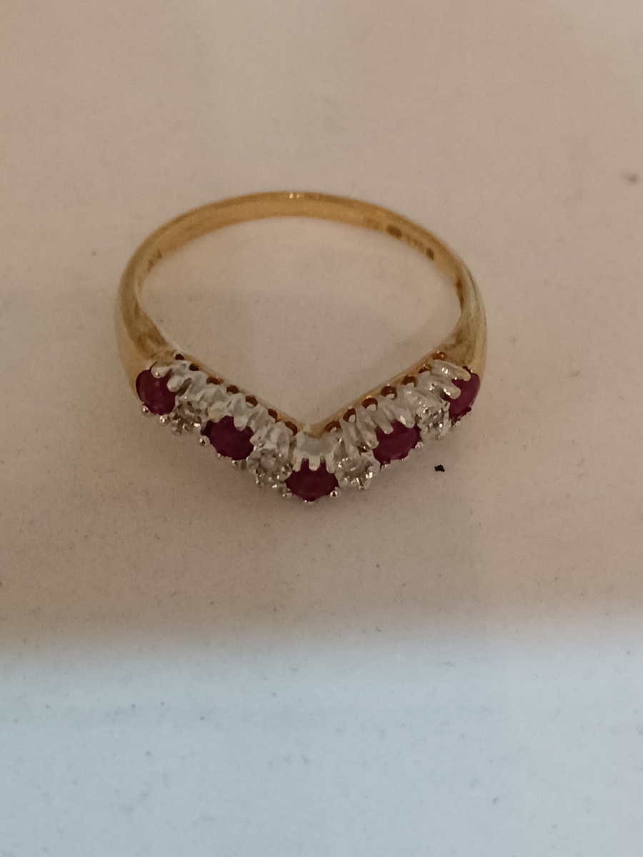 Explore our 9ct gold half eternity ring, adorned with rubies and diamonds. Symbolizing passion, love, and authenticity. Order now!