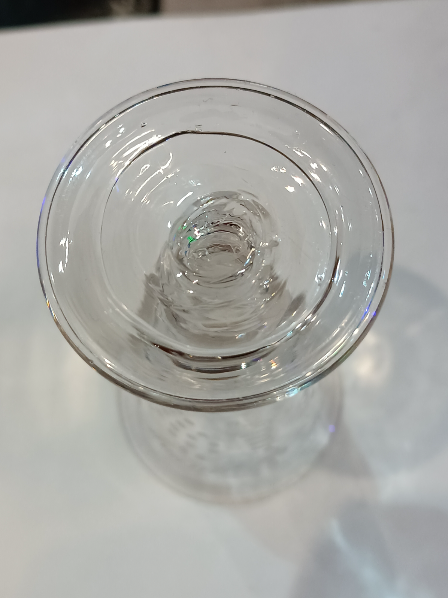 Discover our exclusive Mid 18th c folded foot wine glass with a detailed grape vine engraving. Perfect addition to your collection. Shop now!