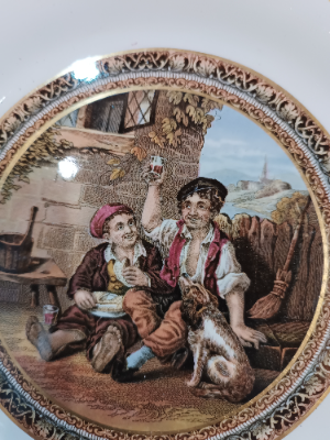 Explore our collection of 19th century Prattware plates. Stunning design featuring 2 celebrating boys. Sized at 21.5 cm. Order now and invest in history!