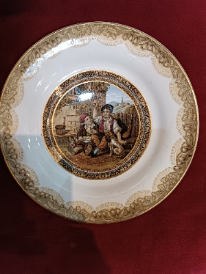 Explore our collection of 19th century Prattware plates. Stunning design featuring 2 celebrating boys. Sized at 21.5 cm. Order now and invest in history!