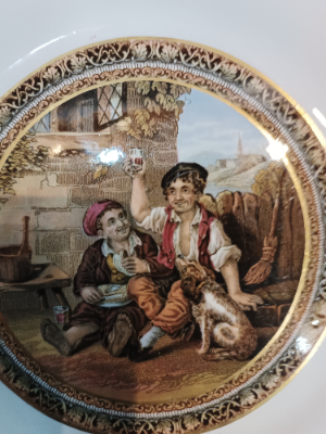 Explore our collection of 19th century Prattware plates. Stunning design featuring 2 celebrating boys. Sized at 21.5 cm. Order now and invest in history!