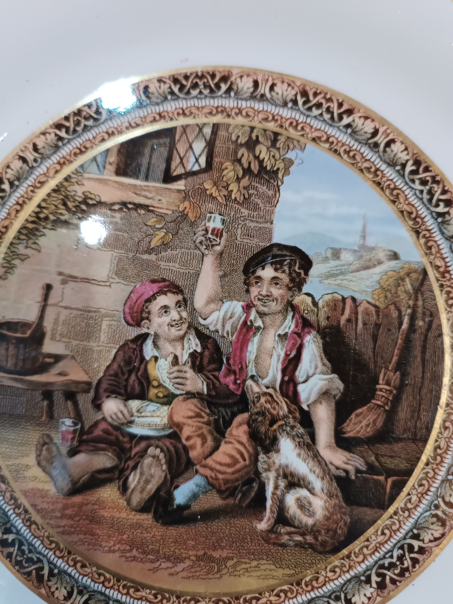 Explore our collection of 19th century Prattware plates. Stunning design featuring 2 celebrating boys. Sized at 21.5 cm. Order now and invest in history!