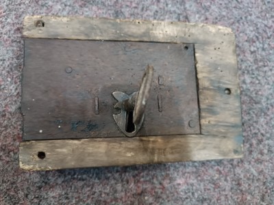 Discover our collection of 19th century iron locks. This feature includes a well-preserved lock in wooden surround with a key. Shop now online for a unique piece of history.