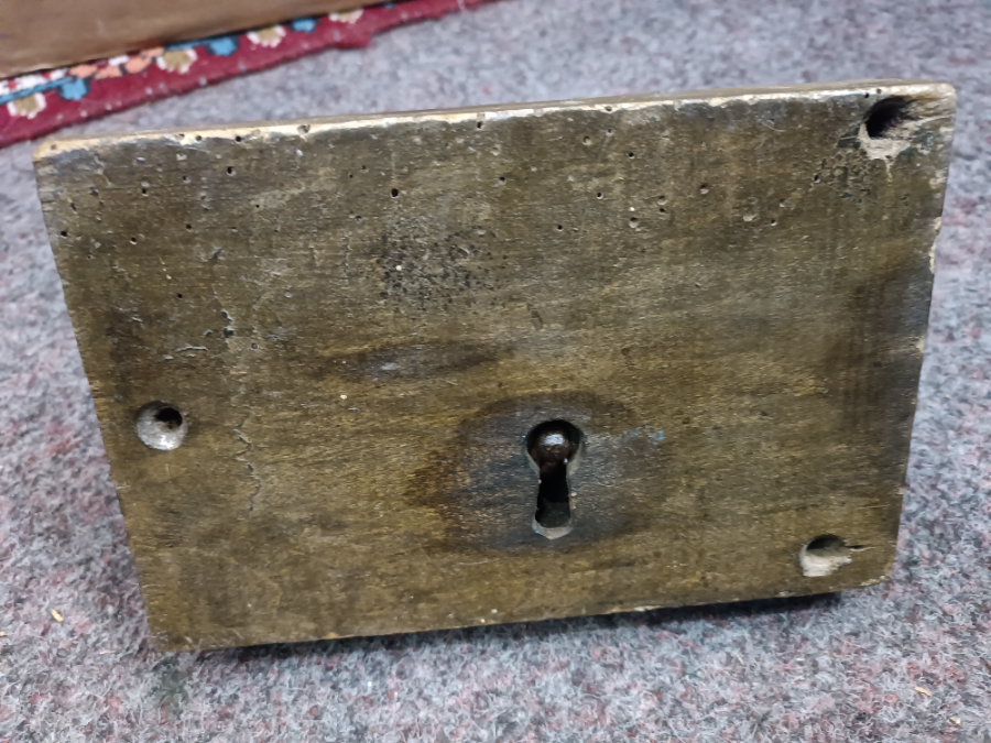 Discover our collection of 19th century iron locks. This feature includes a well-preserved lock in wooden surround with a key. Shop now online for a unique piece of history.