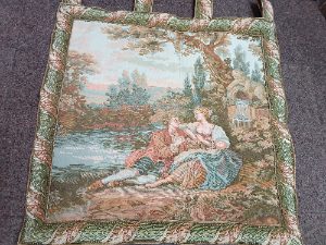 A 20th century Tapestry Of A Courting Couple