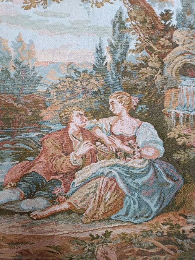 A 20th century Tapestry Of A Courting Couple