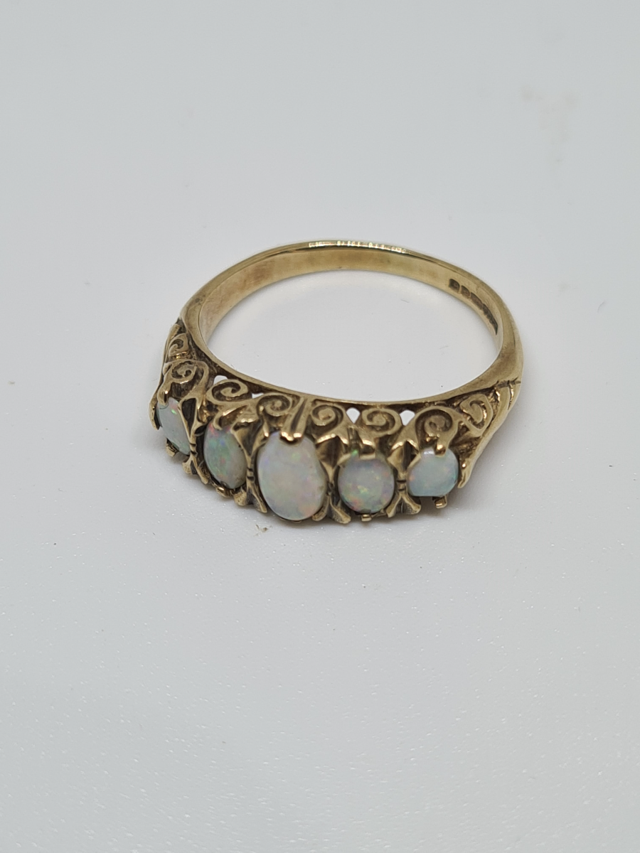 uploads/A-9ct-Gold-Ring-With-5-stones-Of-Opal-Dress-Ring-2165c63824b42afaws.jpg