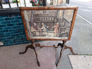 A Carved Mahogany Occasional Table With Tapestry Tilttop