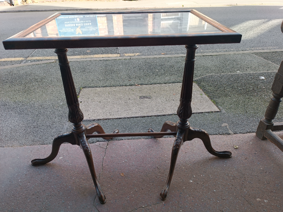 Discover beautiful carved mahogany occasional tables with tapestry inset tilt-tops. Elegant fluted tripod supports provide a sturdy base. Perfectly sized at 60cm x 45cm x 64cm. In excellent condition. Shop now to add a classic touch to your space.