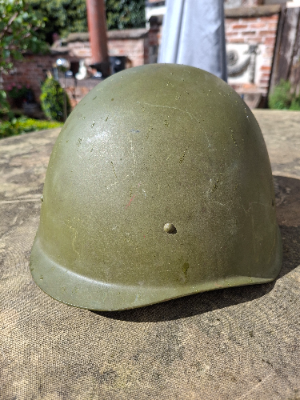 Discover our collection of postwar SSH40 helmets from the Red October Plant, Stalingrad, 1957 edition. Immerse yourself in history with this rare find. Shop now!