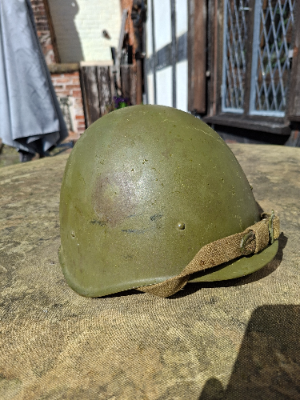 Discover our collection of postwar SSH40 helmets from the Red October Plant, Stalingrad, 1957 edition. Immerse yourself in history with this rare find. Shop now!