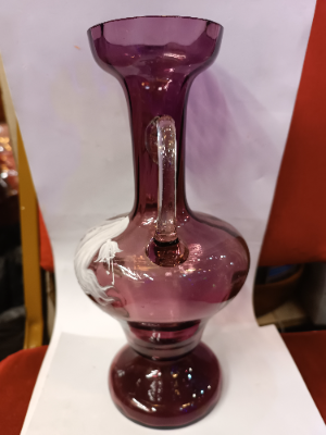 A Mary Gregory amethyst Vase with 2 handles depicting a young lady with hibiscus flowers.  Size 26 cm high.