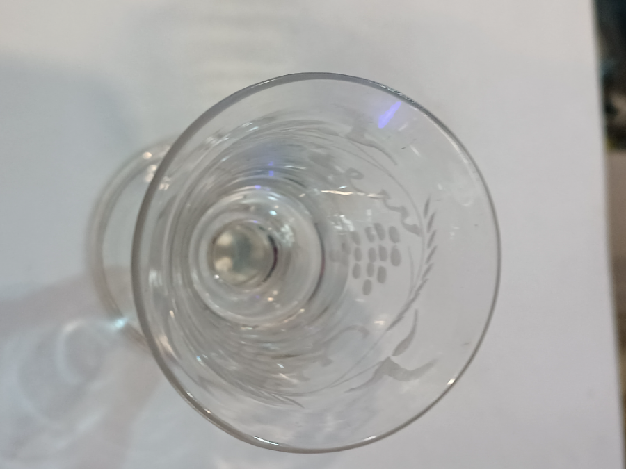 Discover our broad range of mid-18th-century wine glasses. This bucket bowl features a unique grape vine design and measures 10 cm. High. Shop now!