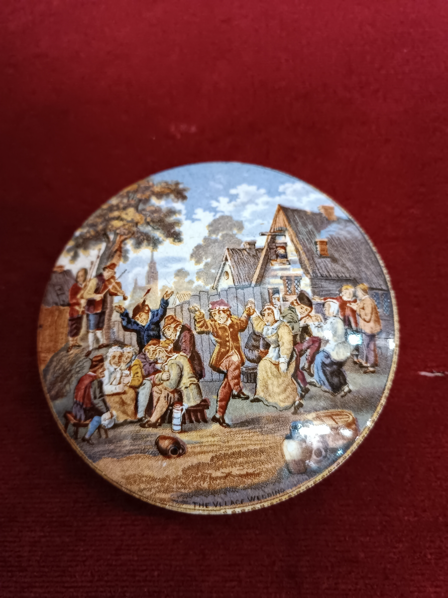 Discover our stunning range of 19th century Prattware pot lids, featuring charming winter village scenes and festive celebrations. Buy now!
