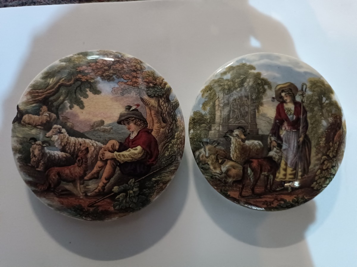 Discover our collection of 19th c Prattware Pot lids, featuring elegant depictions of shepherds and sheep. Explore unique antique lid designs now!