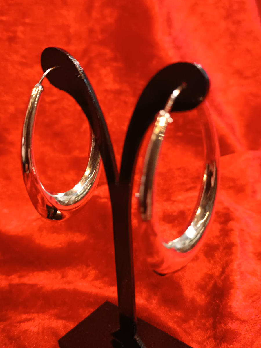 uploads/A-Pair-Of-925-Silver-Filled-Thick-Hoop-Earrings-2165942b53475a4aws.jpg
