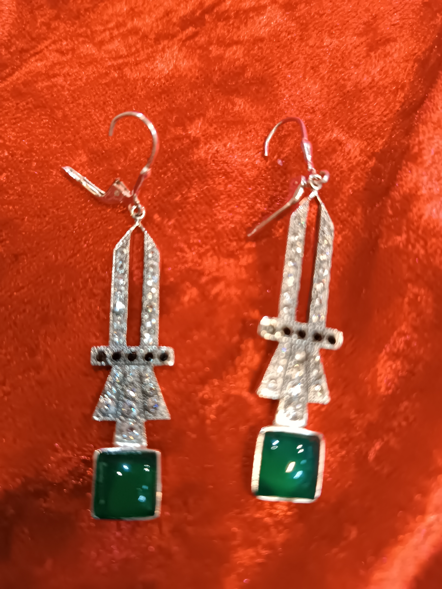 Explore our collection of Art Deco style earrings, intricately crafted with silver, marcasite and green stone cabochons. Shop now for a 925-stamped, 4cm high, 8.3g pair!