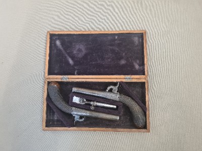 A Pair of Tipping and Lawden Percussion Pistols