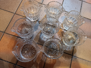 A Set of 8 clear cut glass rinsers, early 19th century, three of them have tiny nibbles on the rim, otherwise in great condition.  Size 9.5 cm across x 9.5 cm high.