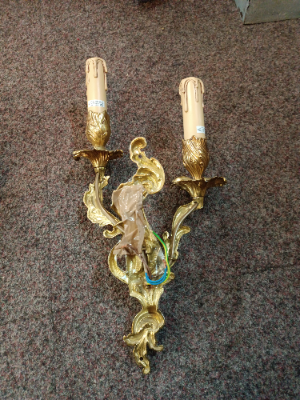 A Set Of Three Rococo Style Gilt Double Wall Lights With Candle Effect Sconces