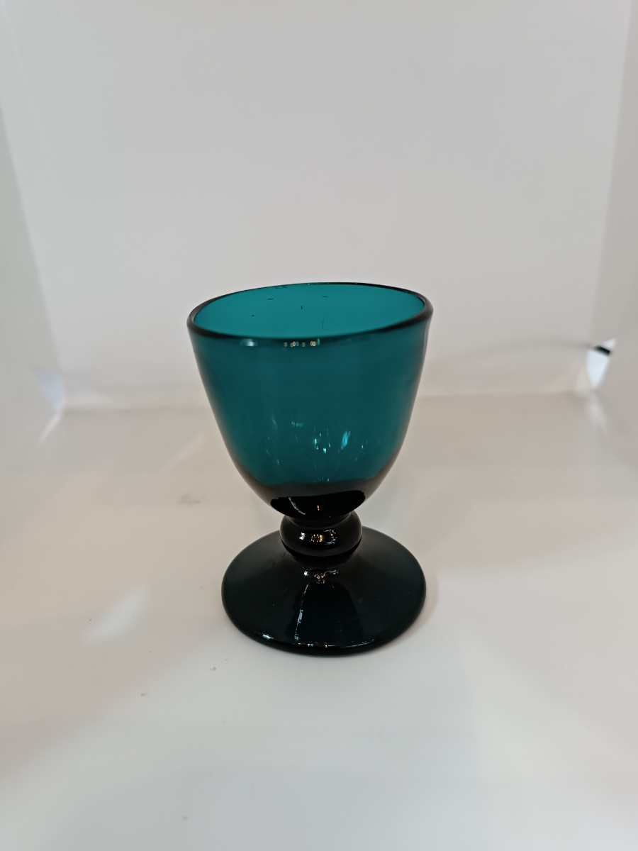 Discover our 19th century, handmade Bristol green liquor glass with pontil marks. Measuring at 7 cm tall and in good condition. Shop now for unique vintage glassware.