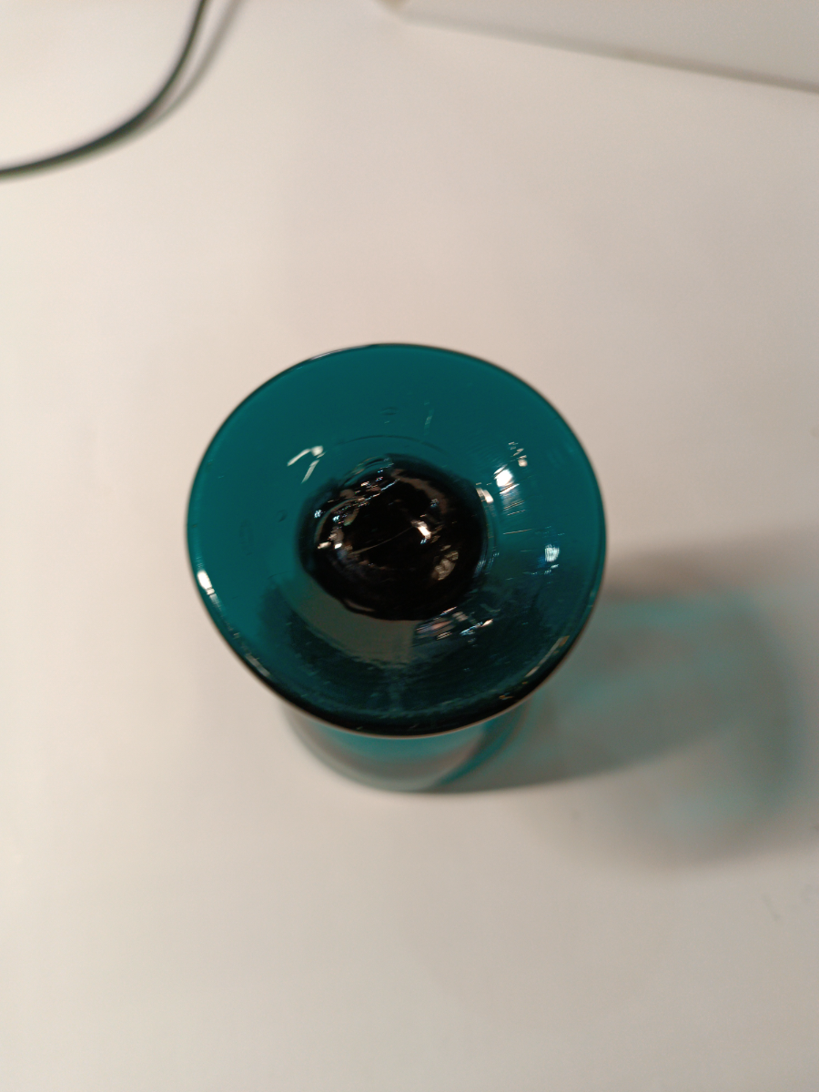 Discover our 19th century, handmade Bristol green liquor glass with pontil marks. Measuring at 7 cm tall and in good condition. Shop now for unique vintage glassware.