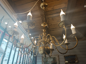 A Solid Brass Eight Branch Ceiling Chandelier