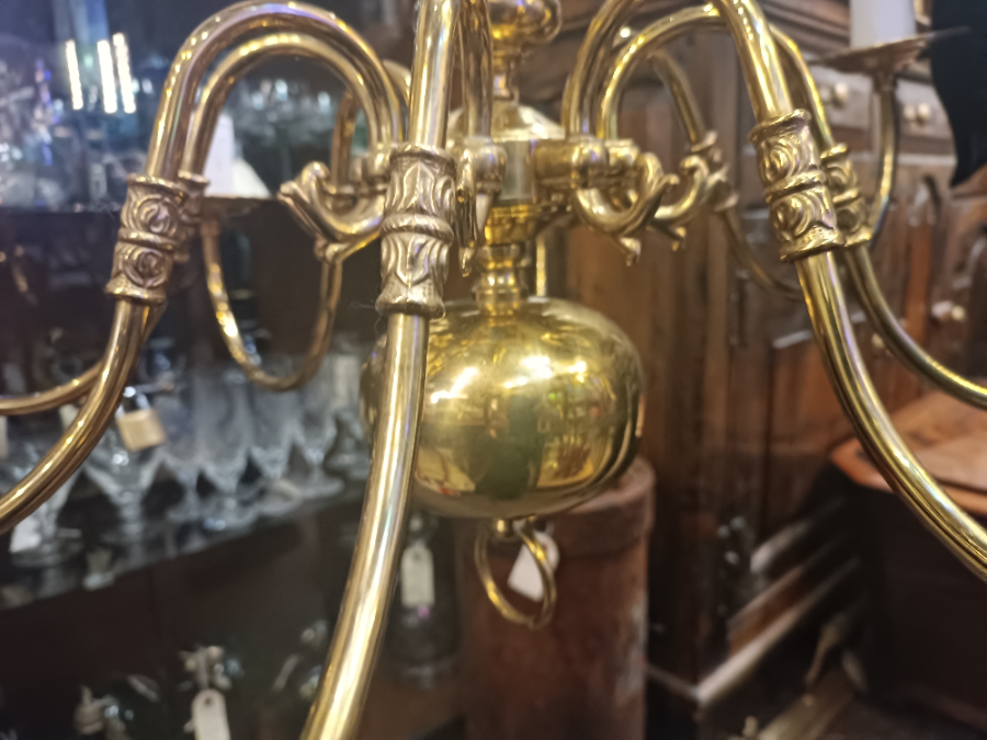 A Solid Brass Eight Branch Ceiling Chandelier