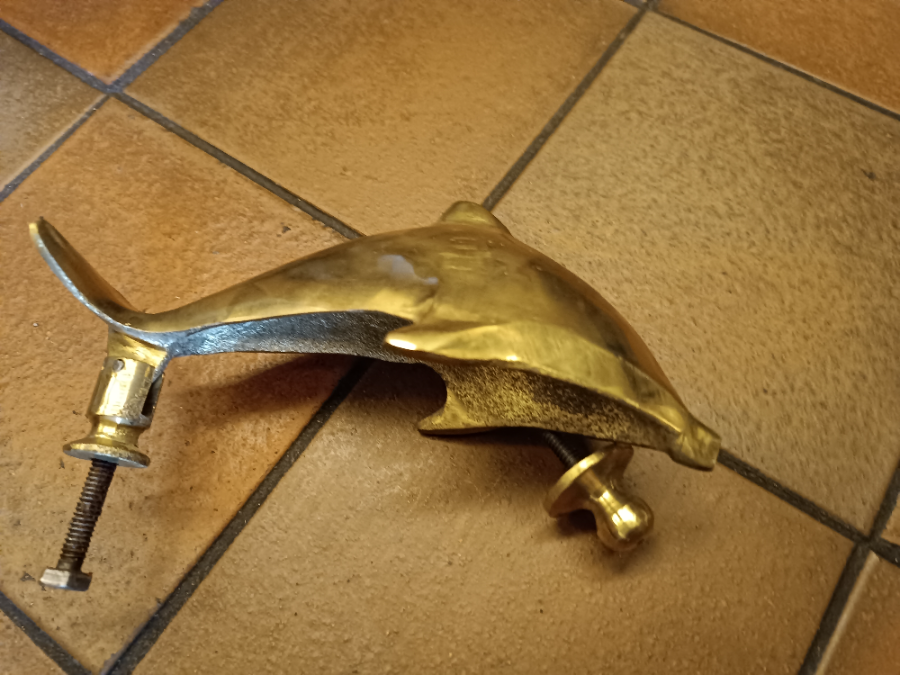 Primary image for A Solid Dolphin Shaped Brass Door Knocker Completed With Bolt Fittings.
