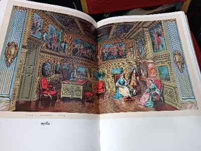 A very large hardback book, "The Complete Costume History" by Augustus Recinet. The book filled with elaborate  colourful illustrations from the ancient world to patterns and templates.  Probably 19-20th century.  Good condition.  Size 45 L x 30  W x 7 cm D.