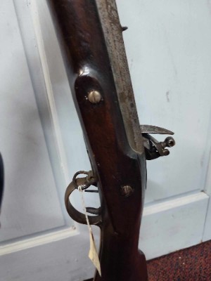 Discover our rare 19th-century American flintlock fowling rifle, perfect for antique firearm enthusiasts. Explore its unique features and order today for a piece of history!