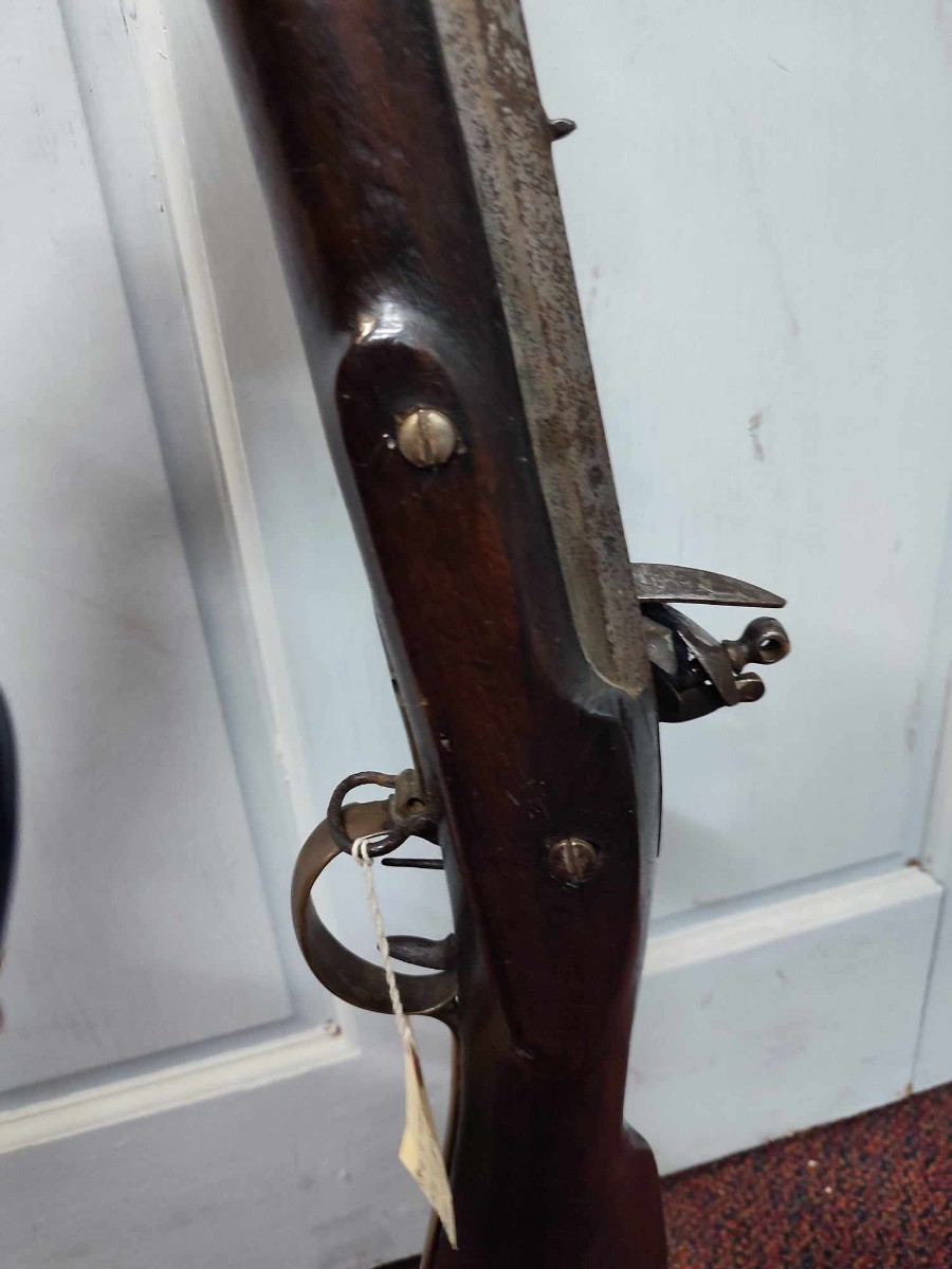 Discover our rare 19th-century American flintlock fowling rifle, perfect for antique firearm enthusiasts. Explore its unique features and order today for a piece of history!