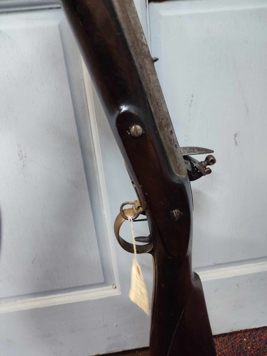 Discover our rare 19th-century American flintlock fowling rifle, perfect for antique firearm enthusiasts. Explore its unique features and order today for a piece of history!