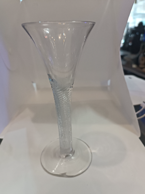 Discover our rare Air Twist Trumpet Bowl from 1745. Impeccably preserved with a snapped off pontil mark. Act now to own this 16 cm high historical gem!