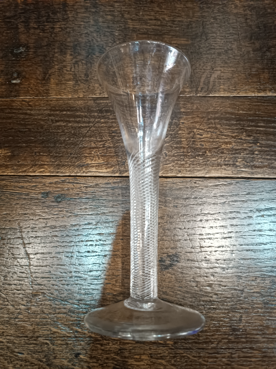 Discover our rare Air Twist Trumpet Bowl from 1745. Impeccably preserved with a snapped off pontil mark. Act now to own this 16 cm high historical gem!