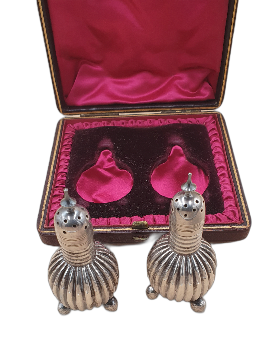 Discover our late 19th-century Art Nouveau styled, silver-plated salt and pepper cruets. Perfect for picnics or a stylish table setup. View photos for details and order yours today!