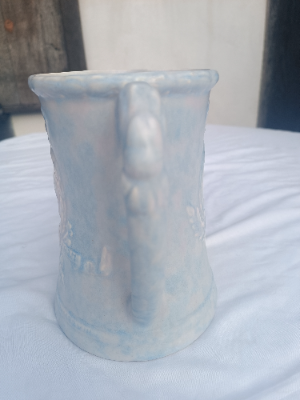 An Arthur Wood Commemorative relief jug, king Edward VIII.  In good condition.  Size 19 cm high.