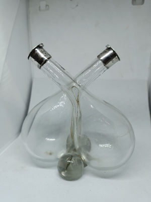 An Edwardian Olive Oil And Vinegar Bottle With Hinged Silver Top